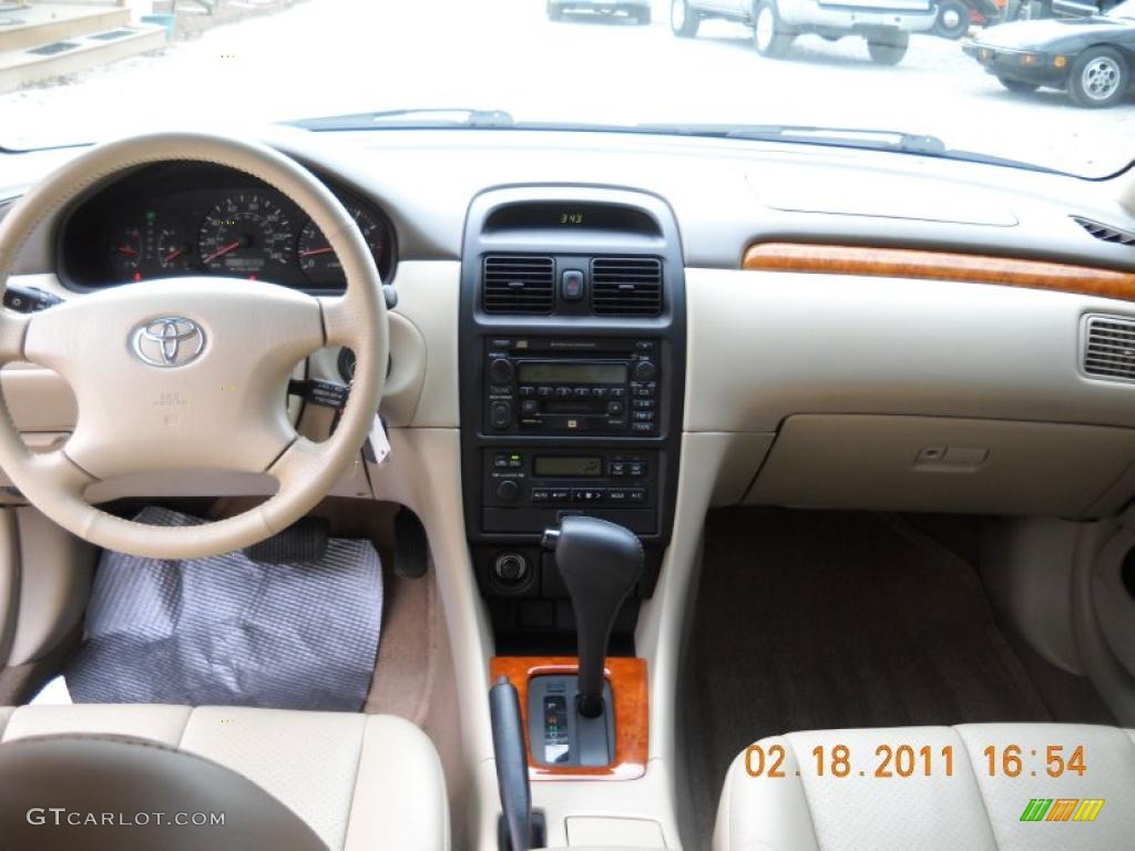 2003 Solara SLE V6 Coupe - Black Sand Pearl / Ivory photo #30