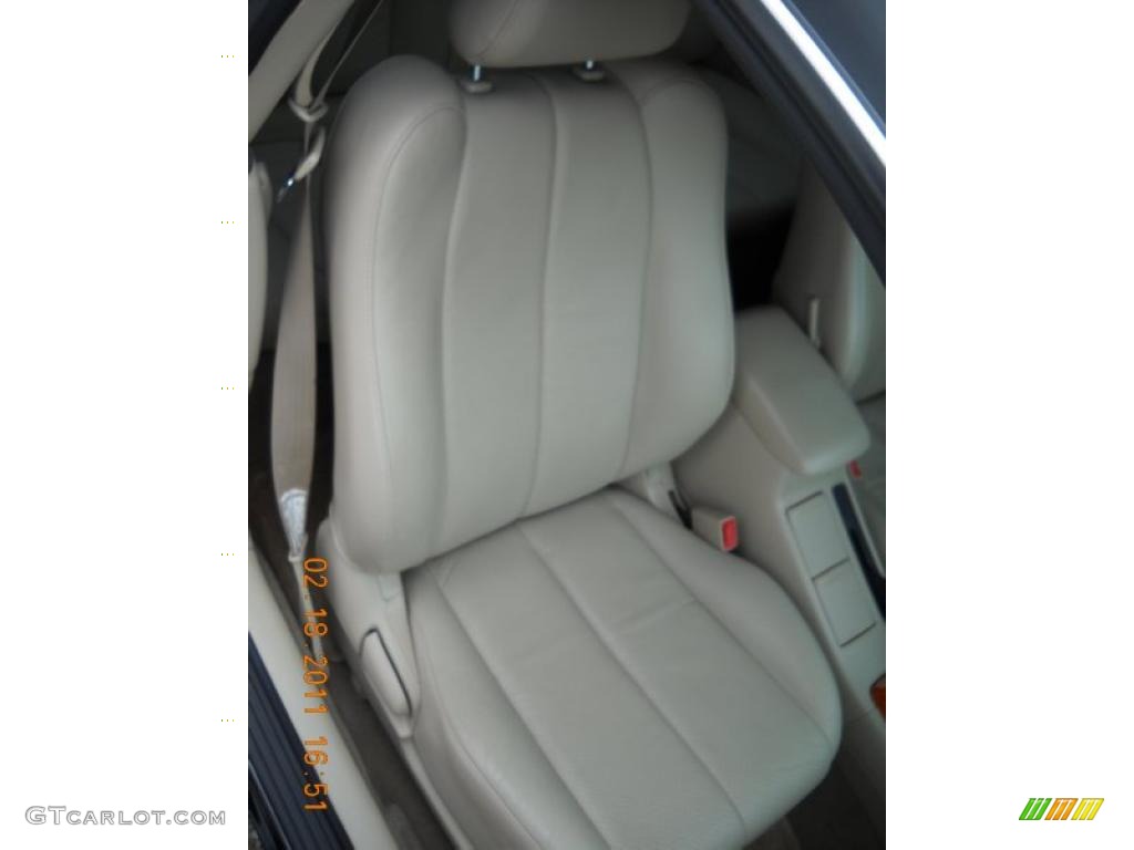 2003 Solara SLE V6 Coupe - Black Sand Pearl / Ivory photo #31