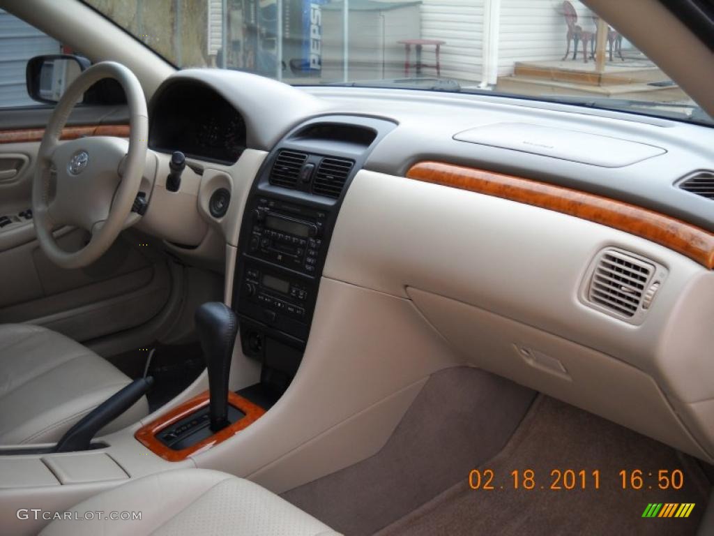 2003 Solara SLE V6 Coupe - Black Sand Pearl / Ivory photo #32