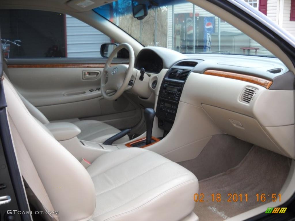 2003 Solara SLE V6 Coupe - Black Sand Pearl / Ivory photo #34