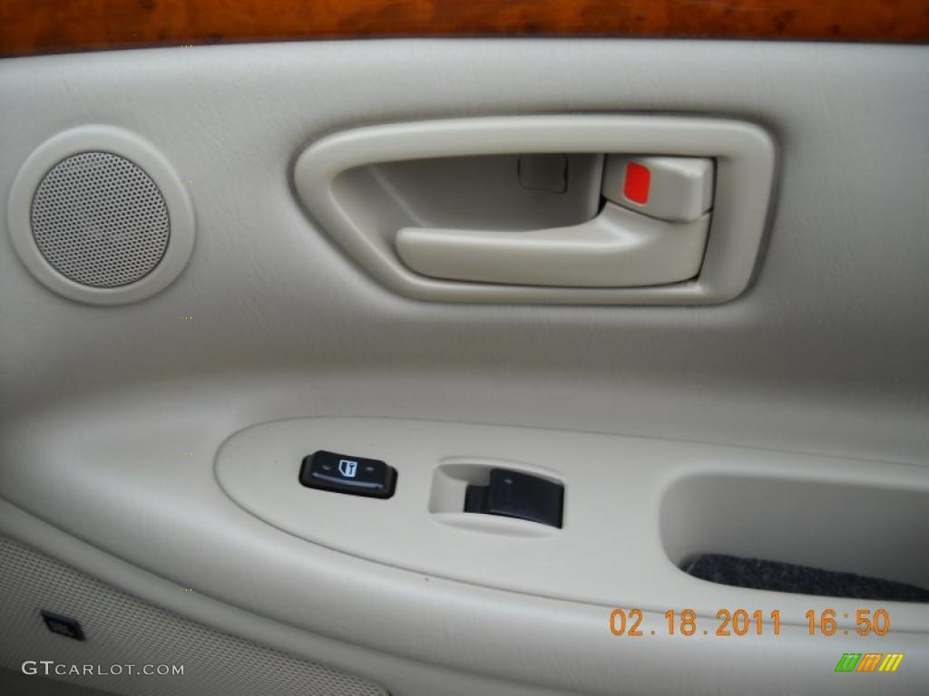 2003 Solara SLE V6 Coupe - Black Sand Pearl / Ivory photo #35