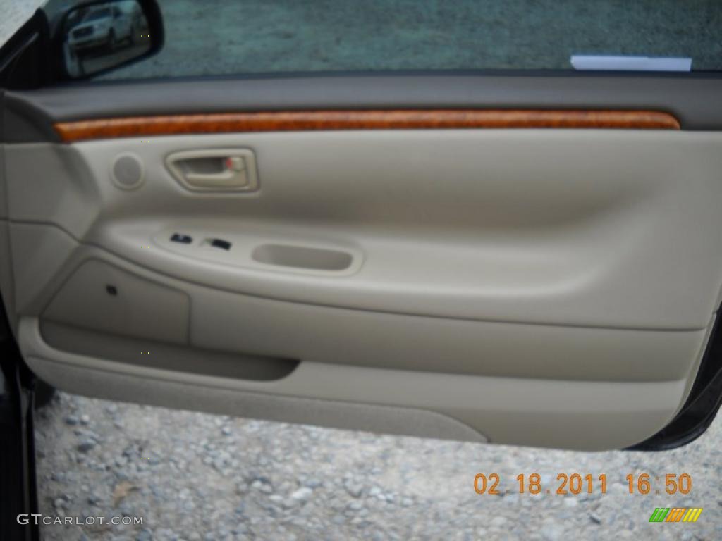 2003 Solara SLE V6 Coupe - Black Sand Pearl / Ivory photo #36