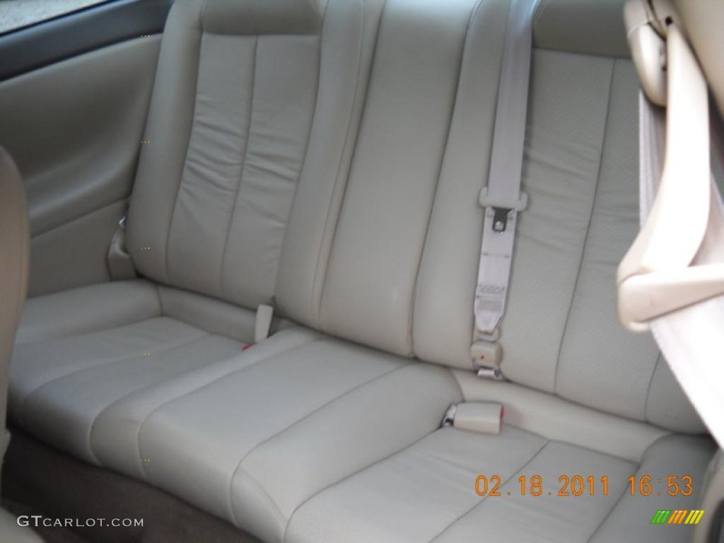 2003 Solara SLE V6 Coupe - Black Sand Pearl / Ivory photo #39