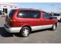2000 Sunfire Red Pearl Toyota Sienna XLE  photo #2