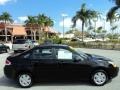 2010 Ebony Black Ford Focus S Sedan  photo #5
