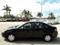 2010 Ebony Black Ford Focus S Sedan  photo #9