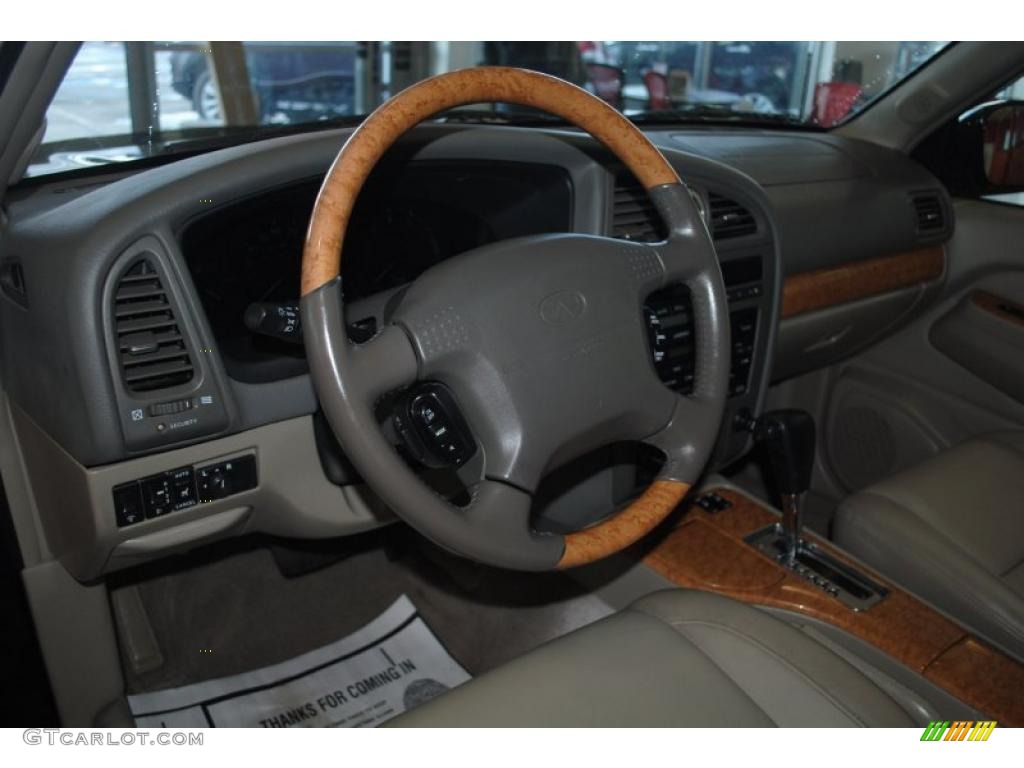 2001 QX4 4x4 - Black Obsidian / Stone Beige photo #12
