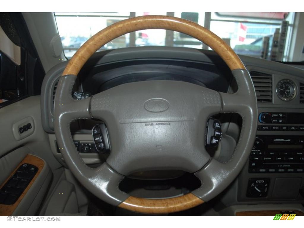 2001 Infiniti QX4 4x4 Stone Beige Steering Wheel Photo #45763159