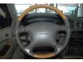 Stone Beige Steering Wheel Photo for 2001 Infiniti QX4 #45763159