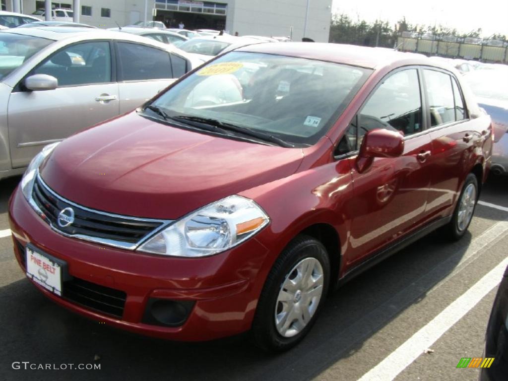 2010 Versa 1.8 S Sedan - Red Brick Metallic / Charcoal photo #1