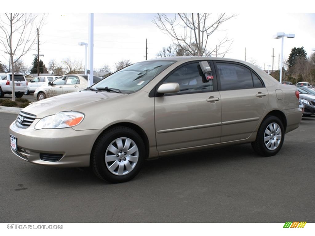 Desert Sand Mica 2004 Toyota Corolla LE Exterior Photo #45797019