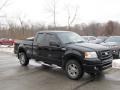 2008 Black Ford F150 STX SuperCab 4x4  photo #1