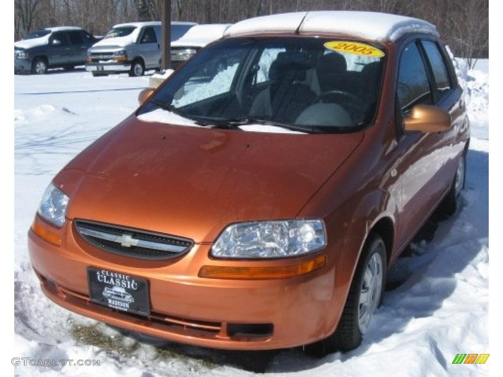 2005 Aveo LS Hatchback - Spicy Orange Metallic / Gray photo #1