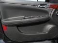 2011 Chevrolet Impala Ebony Interior Door Panel Photo
