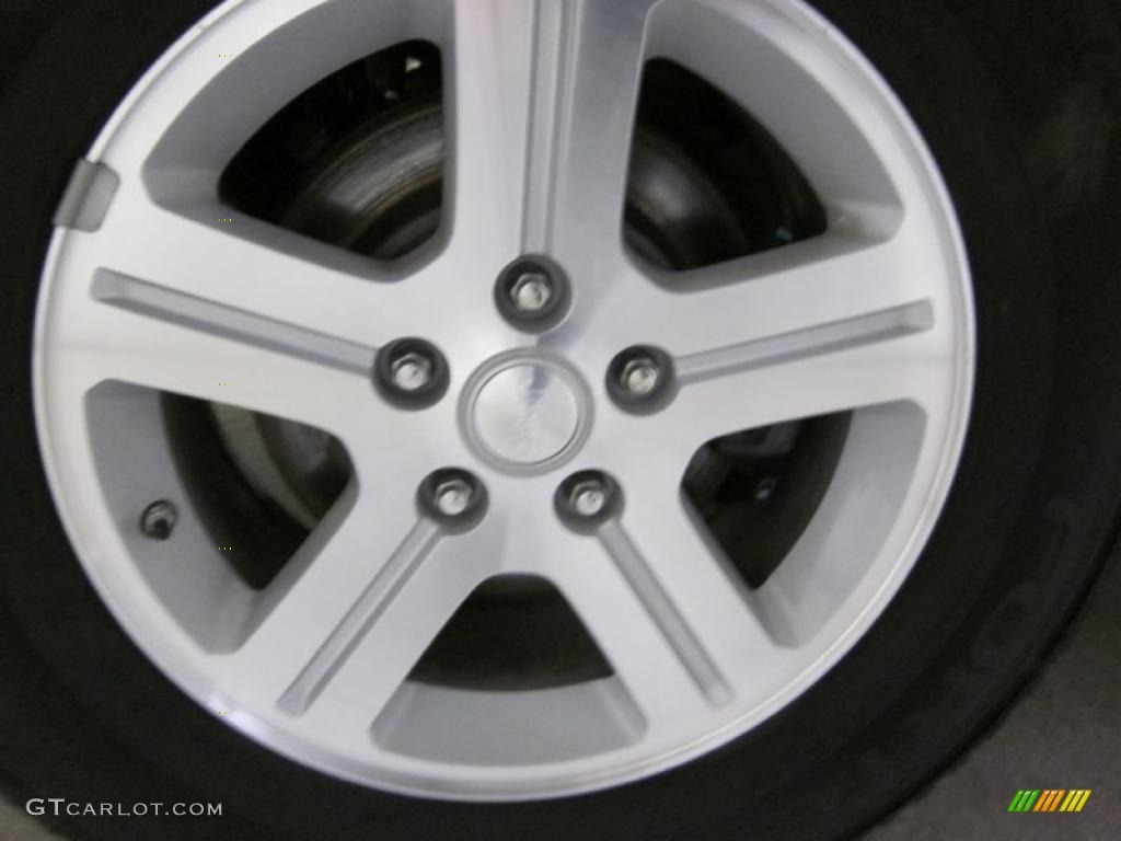 2010 Commander Limited 4x4 - Brilliant Black Crystal Pearl / Dark Slate Gray photo #11