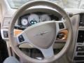 Medium Pebble Beige/Cream Steering Wheel Photo for 2010 Chrysler Town & Country #45916684