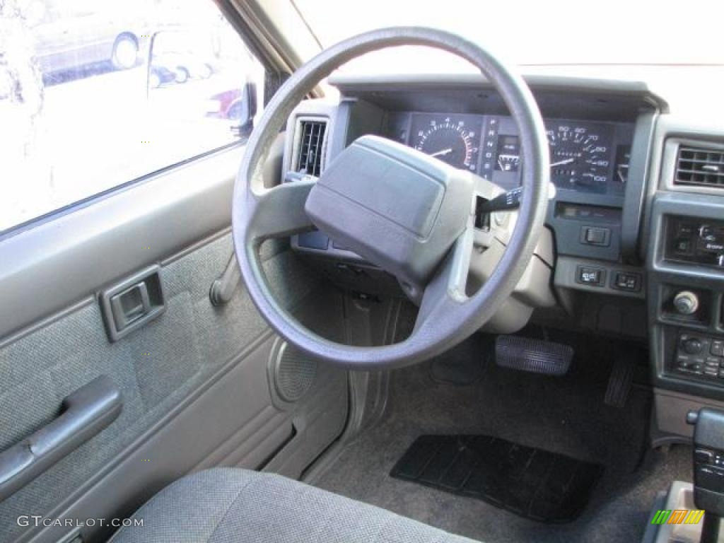 1992 Nissan Pathfinder XE Beige Steering Wheel Photo #45941070