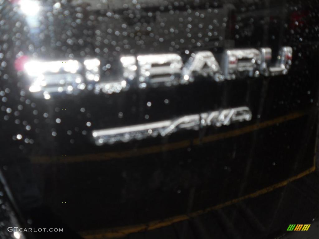 2010 Outback 2.5i Limited Wagon - Crystal Black Silica / Warm Ivory photo #5