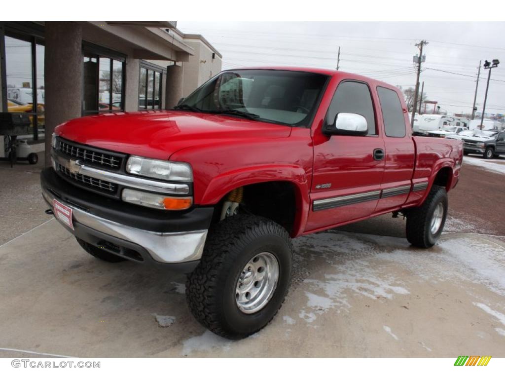 Victory Red 2000 Chevrolet Silverado 1500 LS Extended Cab 4x4 Exterior Photo #45963704