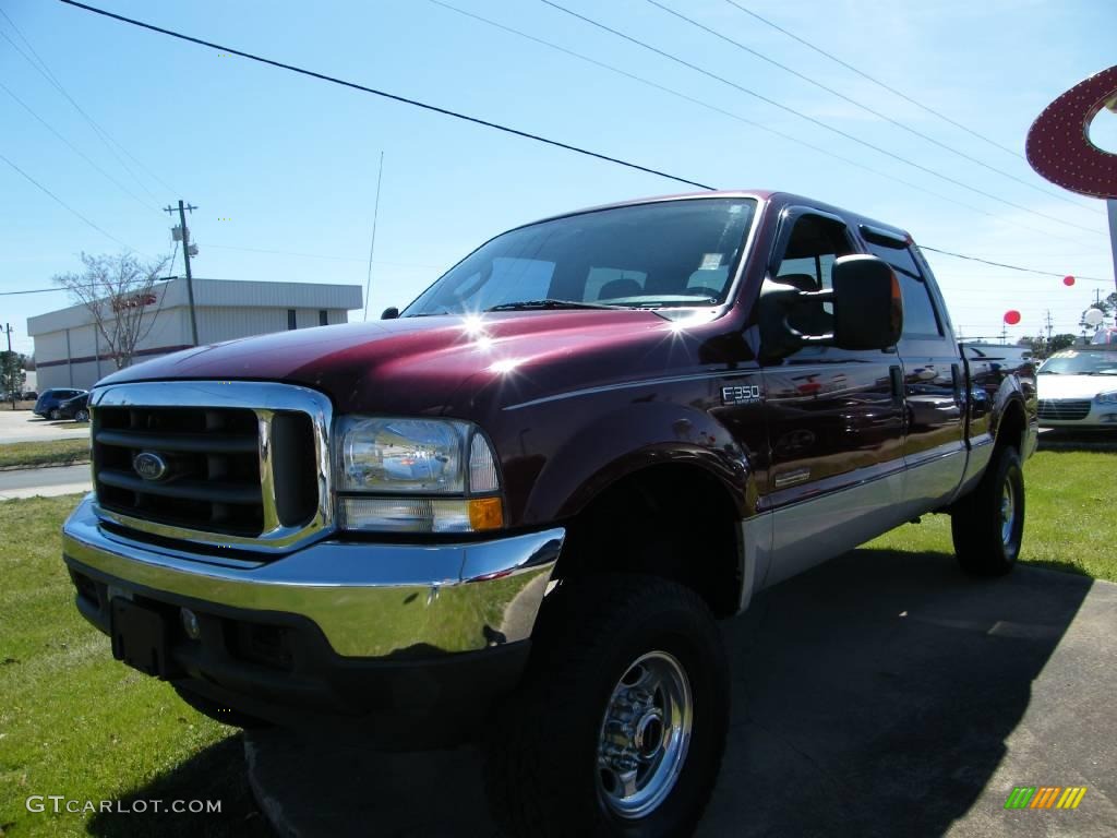 2004 F350 Super Duty Lariat Crew Cab 4x4 - Dark Toreador Red Metallic / Medium Flint photo #1