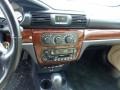 2002 Chrysler Sebring Black/Beige Interior Controls Photo