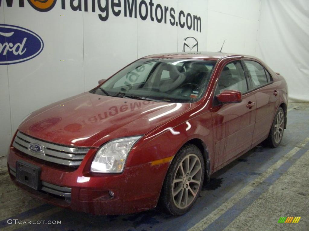 2009 Fusion SE - Redfire Metallic / Charcoal Black photo #1