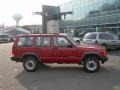 1999 Chili Pepper Red Pearl Jeep Cherokee SE  photo #1