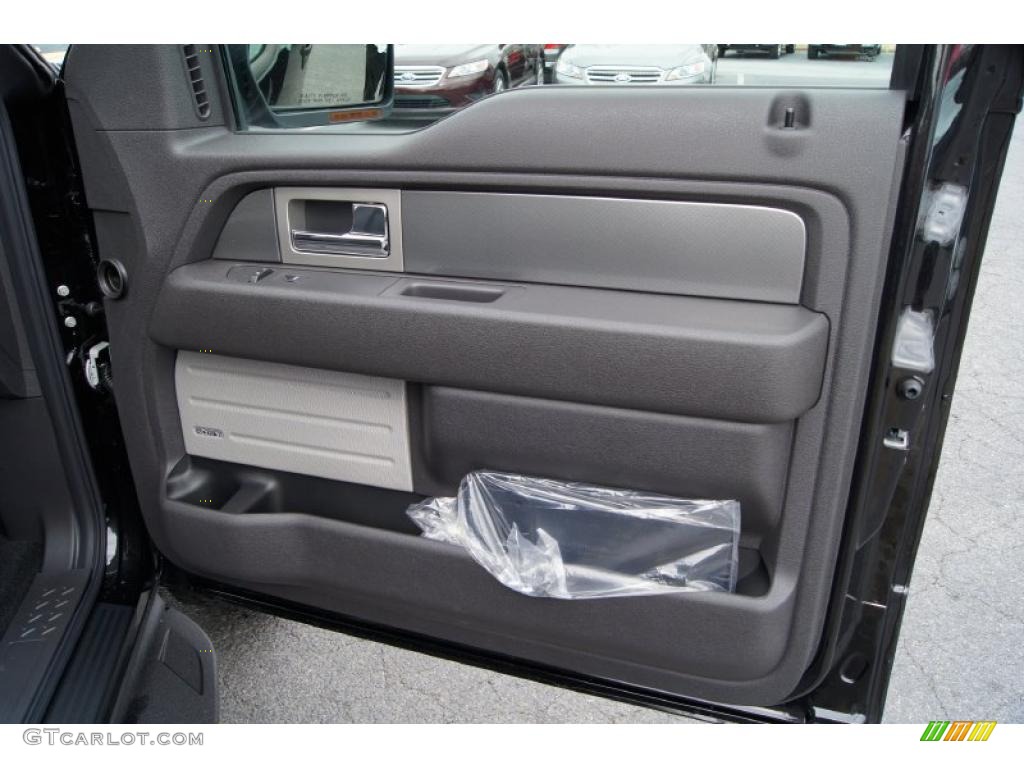 2011 Ford F150 SVT Raptor SuperCrew 4x4 Raptor Black Door Panel Photo #46047095