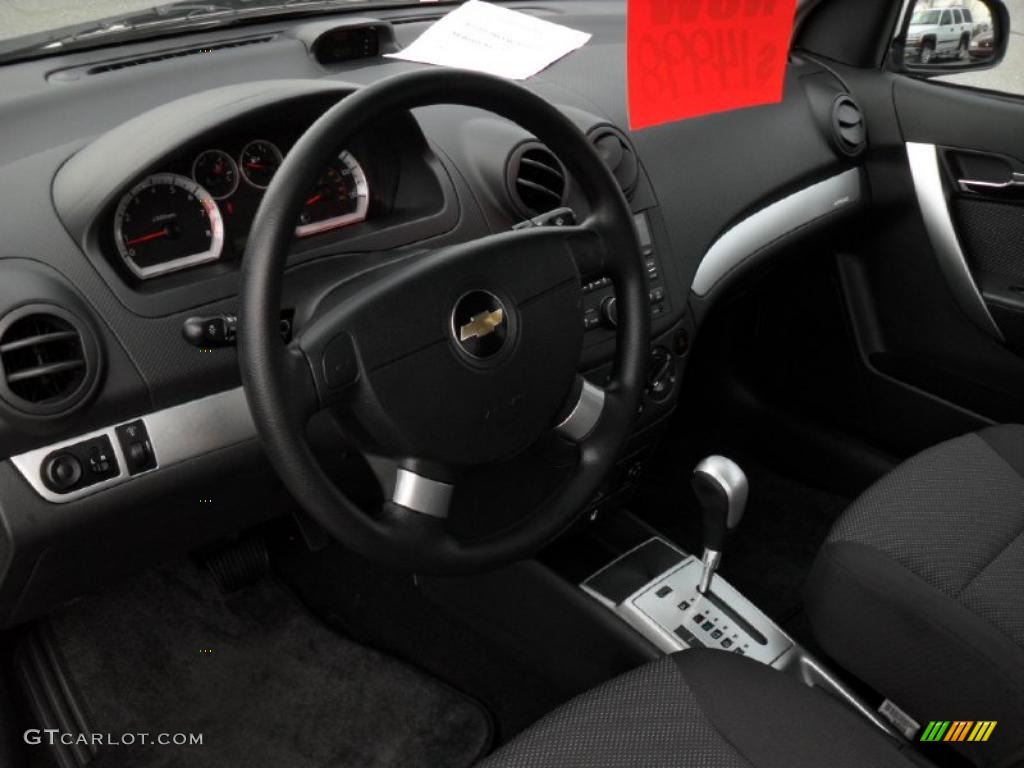 Charcoal Interior 2011 Chevrolet Aveo LT Sedan Photo #46062639