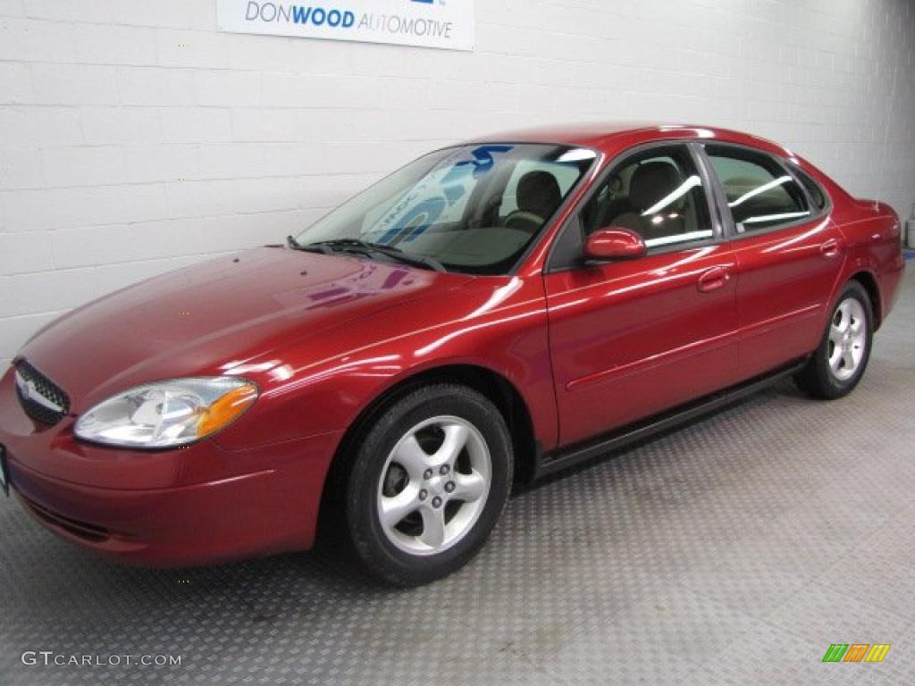 2000 Taurus SE - Toreador Red Metallic / Medium Parchment photo #2
