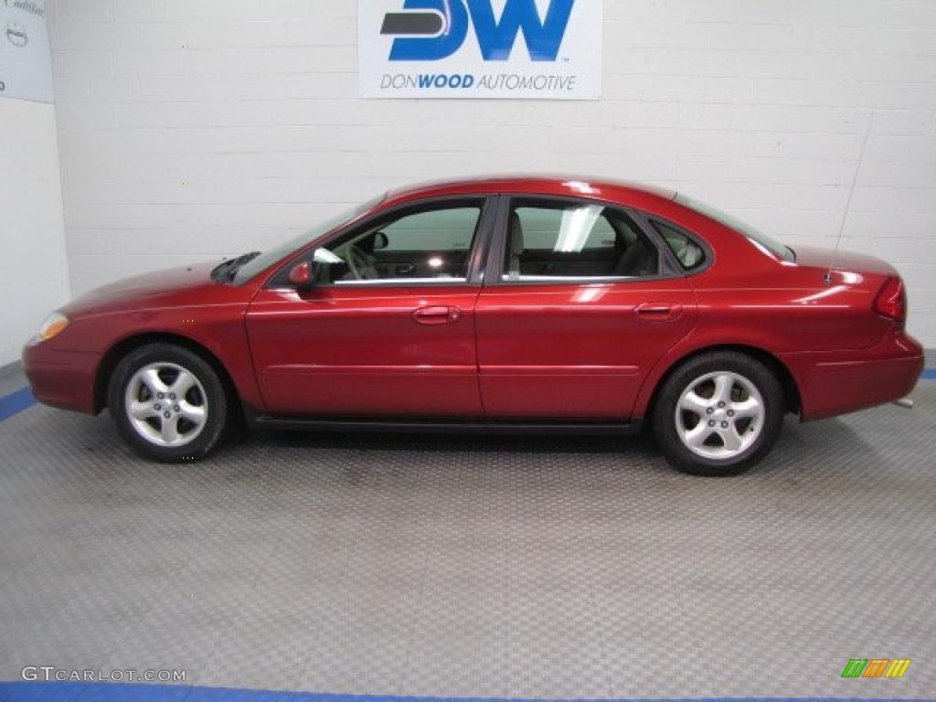 2000 Taurus SE - Toreador Red Metallic / Medium Parchment photo #5