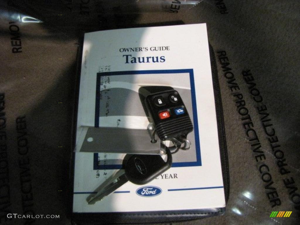 2000 Taurus SE - Toreador Red Metallic / Medium Parchment photo #22