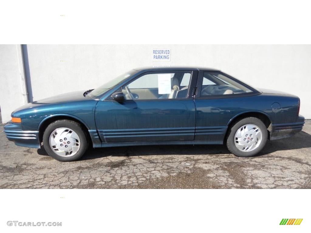 Dark Teal Metallic 1995 Oldsmobile Cutlass Supreme SL Coupe Exterior Photo #46083021