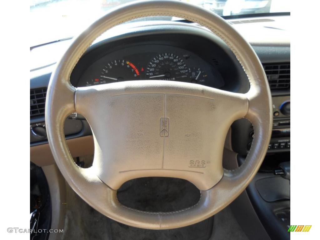 1995 Oldsmobile Cutlass Supreme SL Coupe Beige Steering Wheel Photo #46083069