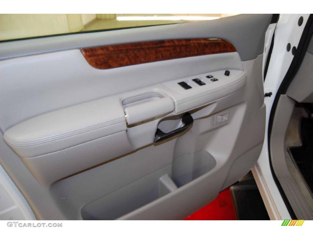 2010 Nissan Armada Titanium Stone Door Panel Photo #46086650