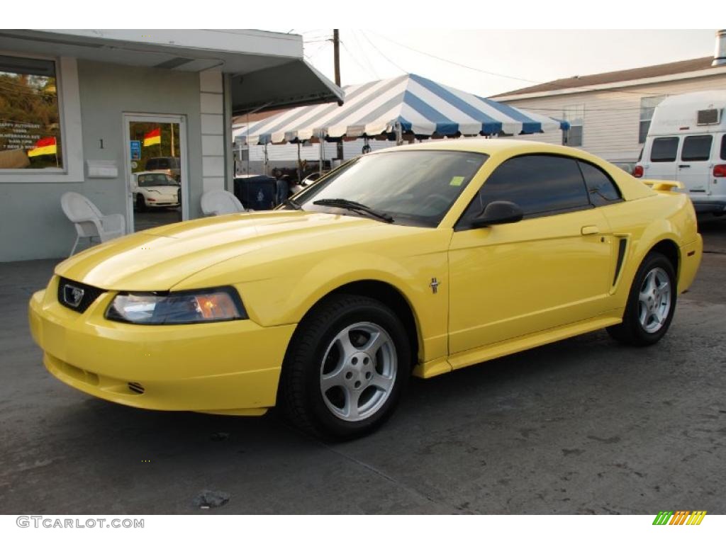 2003 Mustang V6 Coupe - Zinc Yellow / Dark Charcoal photo #1