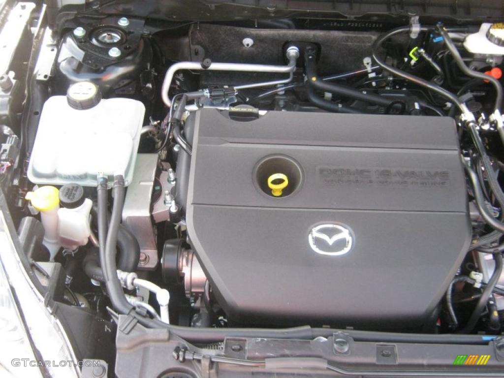 2011 MAZDA3 i Touring 4 Door - Black Mica / Black photo #22