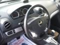 Charcoal Steering Wheel Photo for 2011 Chevrolet Aveo #46103687