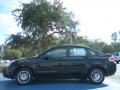 2011 Ebony Black Ford Focus SE Sedan  photo #2