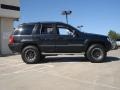 2004 Jeep Grand Cherokee Special Edition 4x4 Wheel and Tire Photo