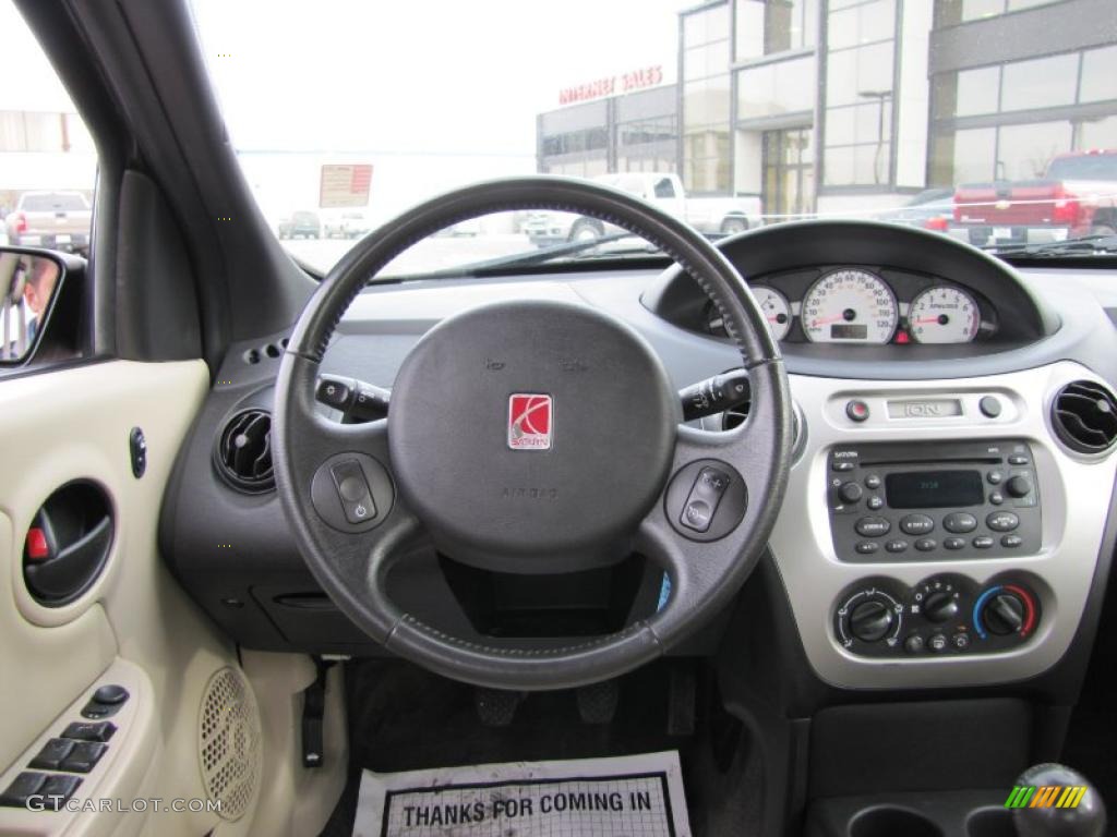 2004 Saturn ION 3 Sedan Tan Dashboard Photo #46117601