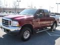 2004 Dark Toreador Red Metallic Ford F250 Super Duty XLT SuperCab 4x4  photo #2