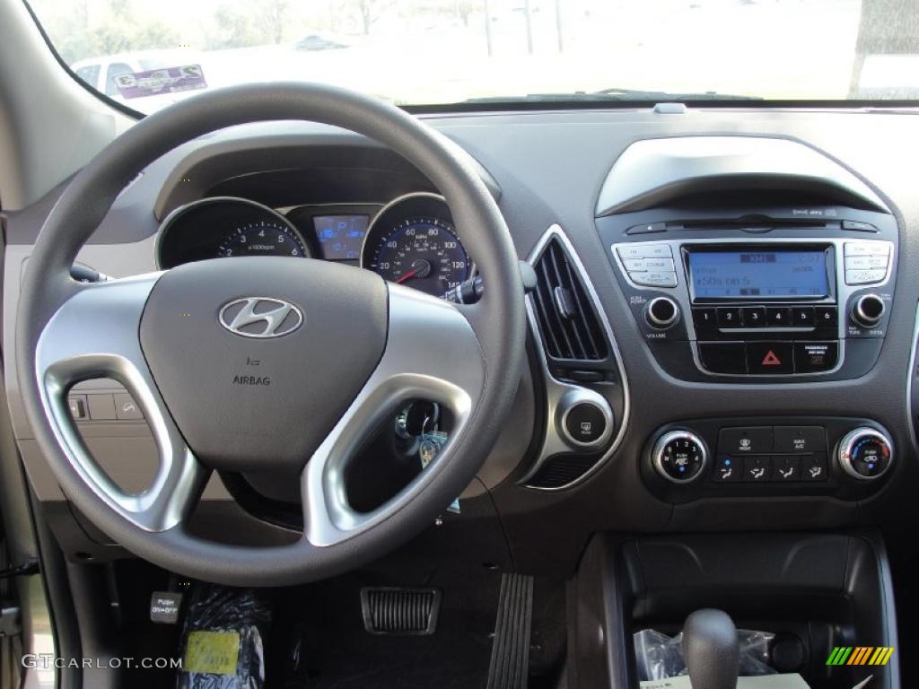 2011 Hyundai Tucson GL Taupe Dashboard Photo #46142599