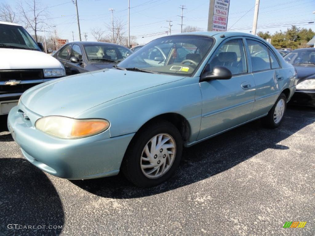 1999 Escort SE Sedan - Aquamarine Frost Metallic / Medium Prairie Tan photo #1