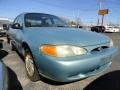 Aquamarine Frost Metallic 1999 Ford Escort SE Sedan Exterior