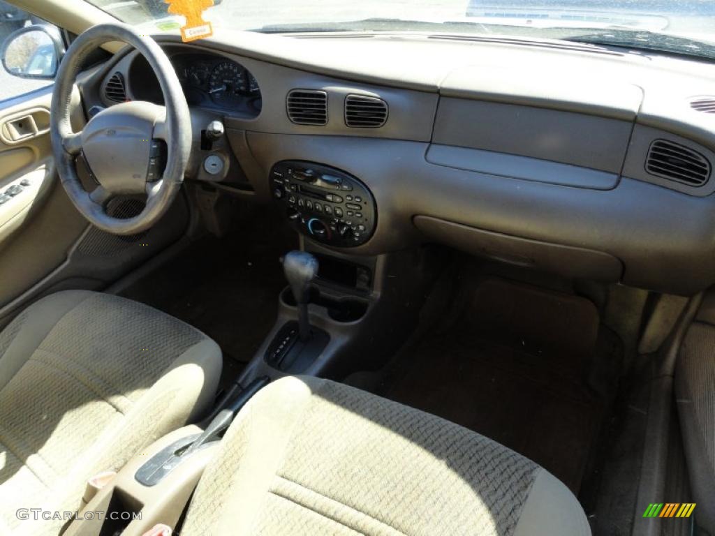 1999 Escort SE Sedan - Aquamarine Frost Metallic / Medium Prairie Tan photo #10