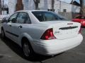 2004 Cloud 9 White Ford Focus LX Sedan  photo #9