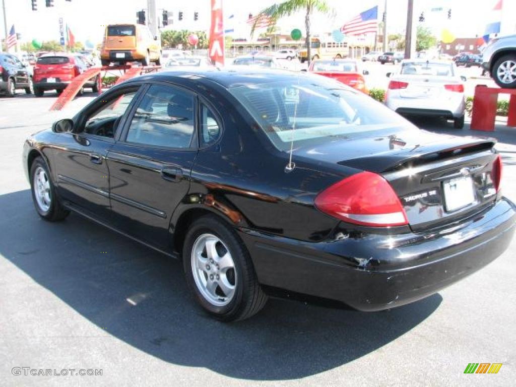 2004 Taurus SE Sedan - Black / Medium Graphite photo #7