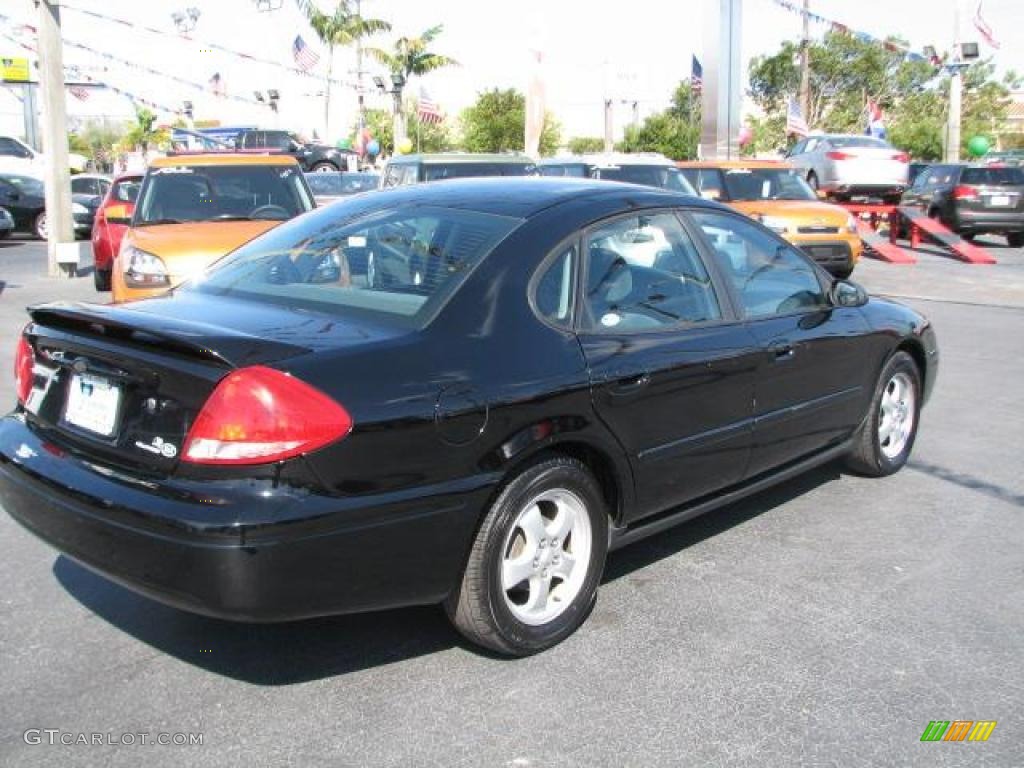 2004 Taurus SE Sedan - Black / Medium Graphite photo #11