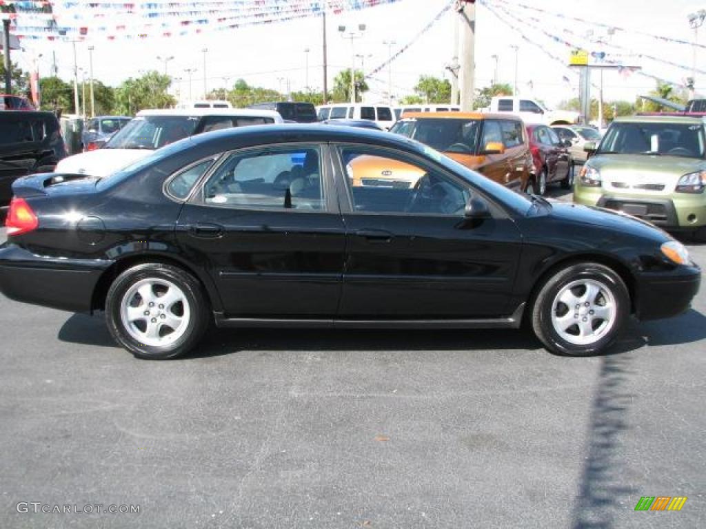2004 Taurus SE Sedan - Black / Medium Graphite photo #12